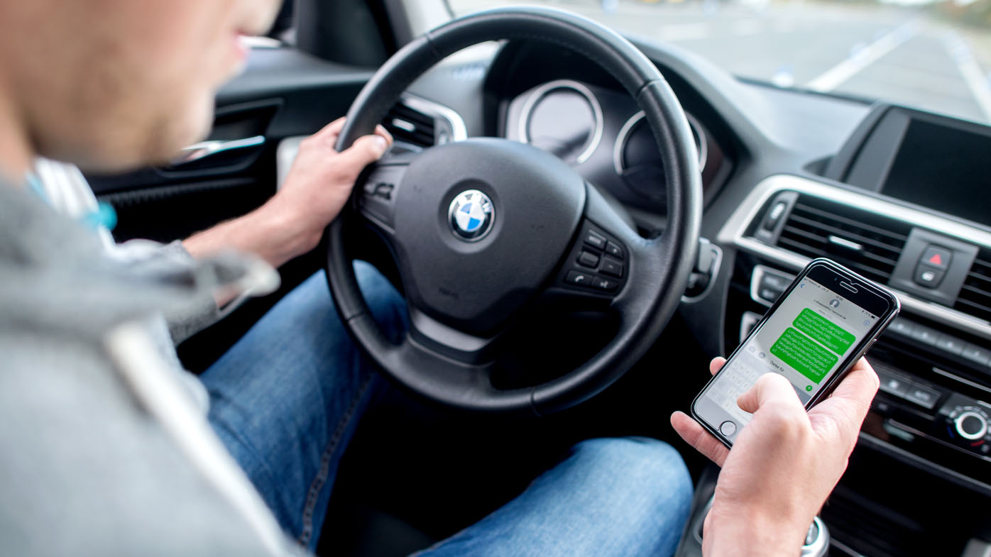 $1000 fines for drivers using a mobile phone queensland