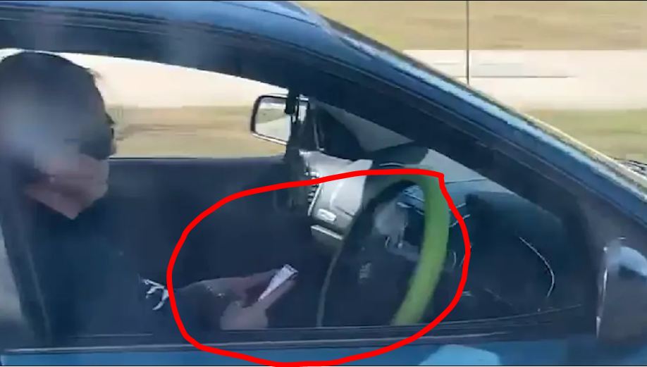 female driver hands off the wheel brisbane