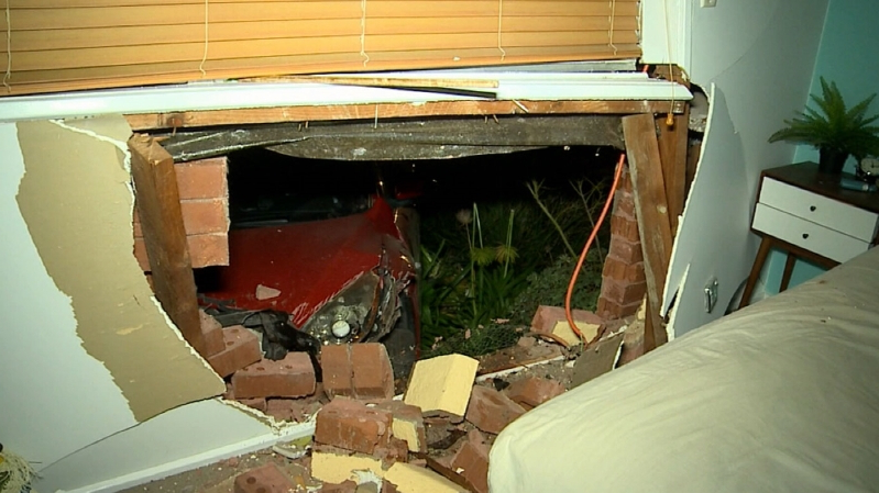 Couple's lucky escape after stolen car crashes into bedroom