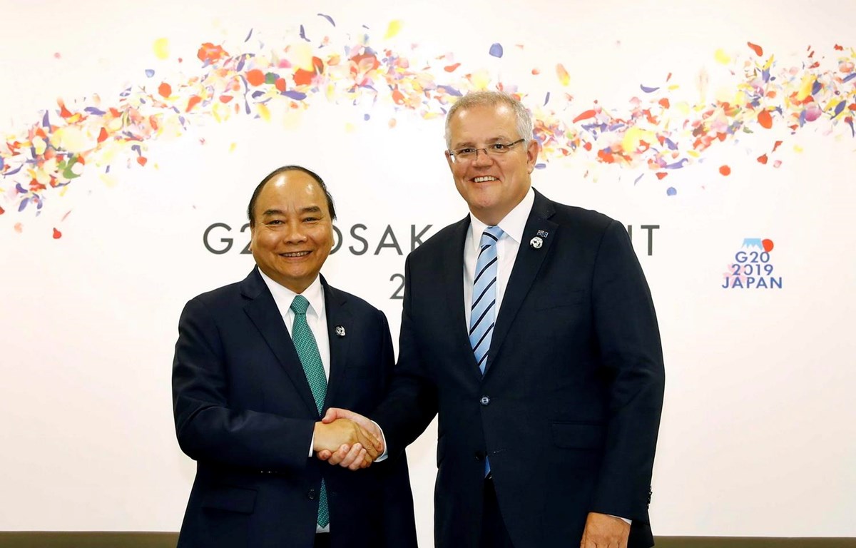Thủ tướng Nguyễn Xuân Phúc gặp Thủ tướng Australia Scott Morrison ở G20, tổ chức tại thành phố Osaka của Nhật Bản. (Ảnh: Thống Nhất/TTXVN)